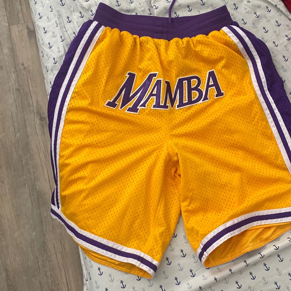 Custom “MAMBA” laker themed shorts with pockets and zipper pockets on back